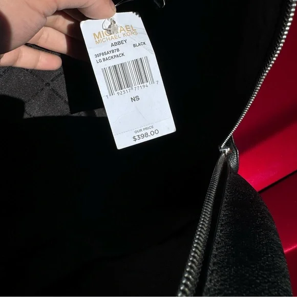 Two Michael Kors backpacks very good condition. Original tags with both bags!